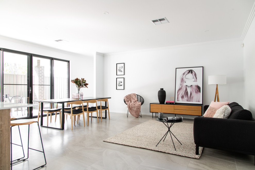 Living room - contemporary open concept gray floor living room idea in Adelaide with white walls