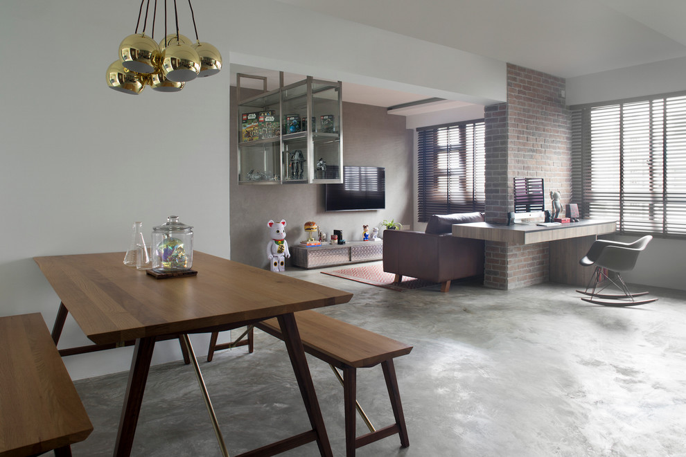 Источник вдохновения для домашнего уюта: большая открытая гостиная комната в стиле лофт с серыми стенами и бетонным полом