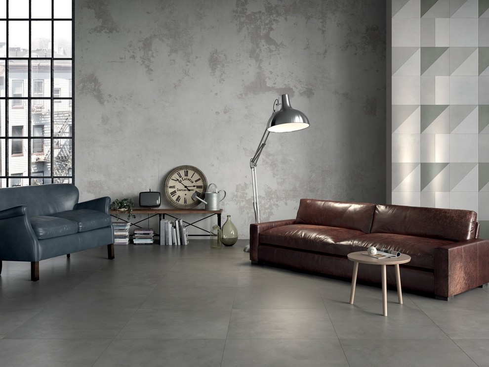 Ispirazione per un soggiorno con pavimento in gres porcellanato e pavimento grigio