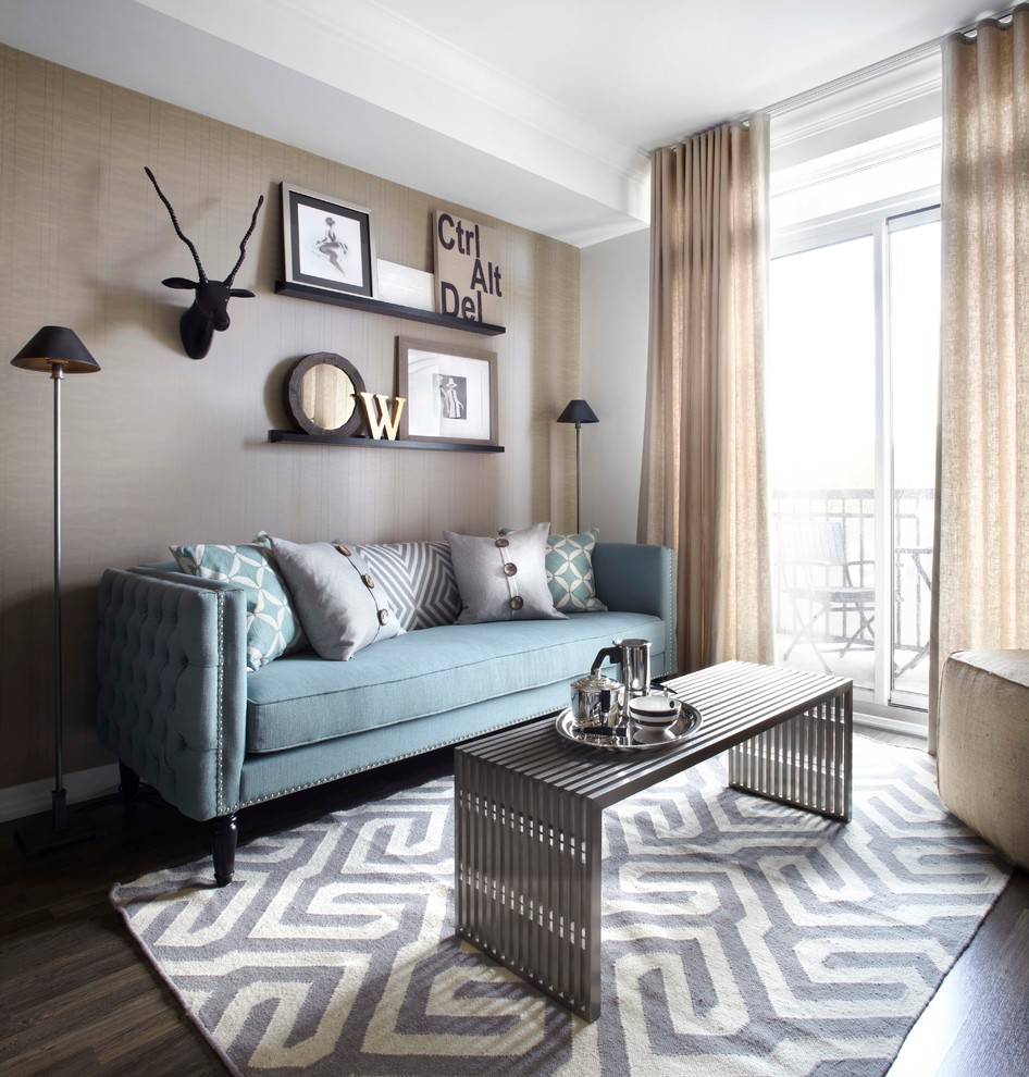 Example of a small trendy open concept dark wood floor and brown floor living room design in Toronto with beige walls