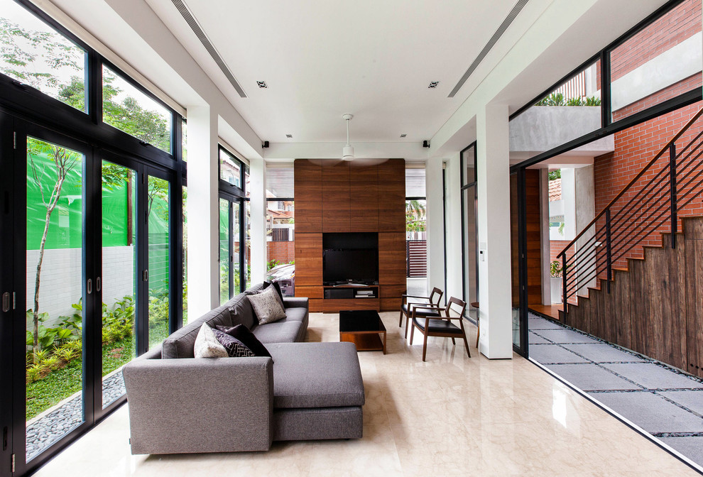 Photo of a contemporary living room in Singapore with white walls and no fireplace.