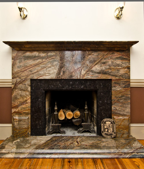 Fireplace surround that features natural stone