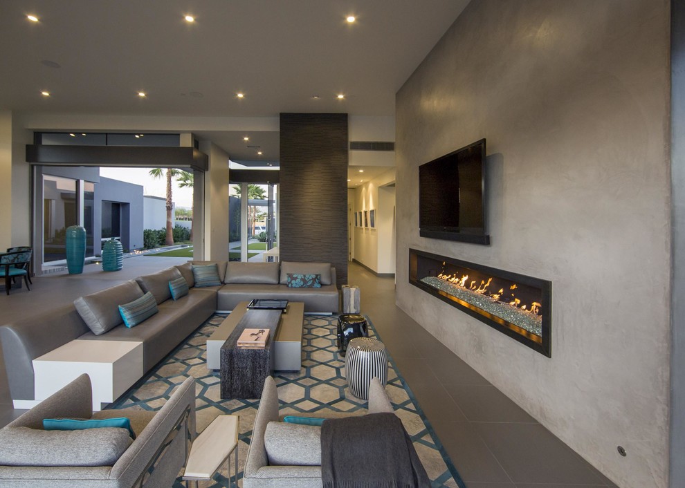 Design ideas for a large contemporary open plan living room in Orange County with grey walls, ceramic flooring, a ribbon fireplace, a concrete fireplace surround and a wall mounted tv.