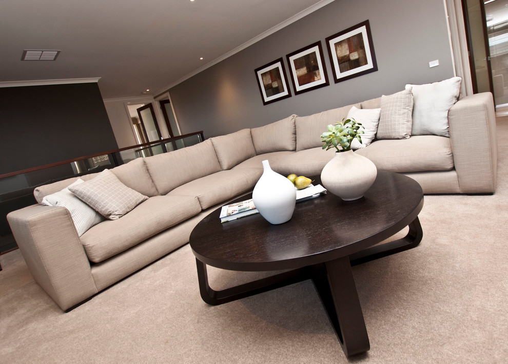 Medium sized modern formal mezzanine living room in Melbourne with brown walls and carpet.