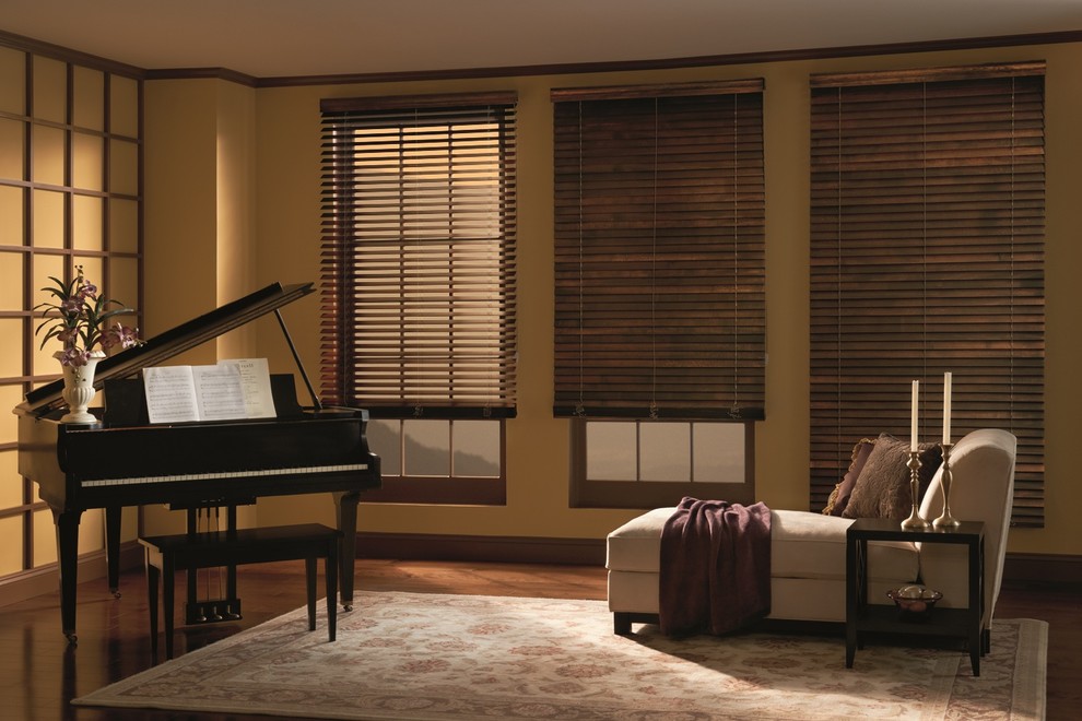 Mid-sized transitional enclosed dark wood floor and brown floor living room photo in Baltimore with yellow walls and no tv