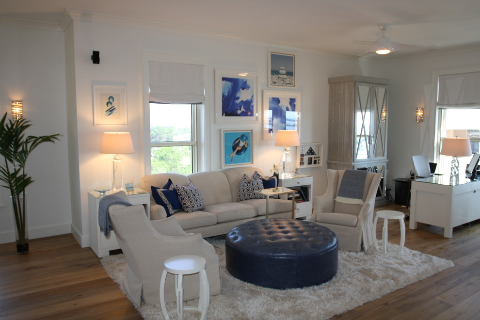 Medium sized nautical formal enclosed living room in Miami with white walls, medium hardwood flooring, no fireplace and no tv.
