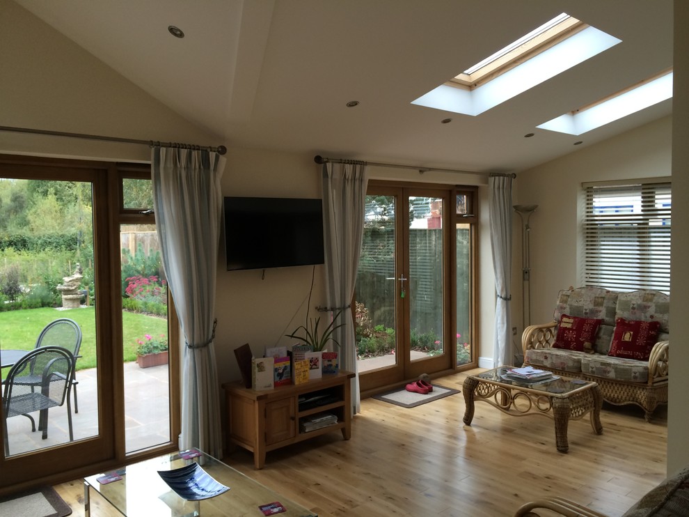 Living room - modern living room idea in West Midlands