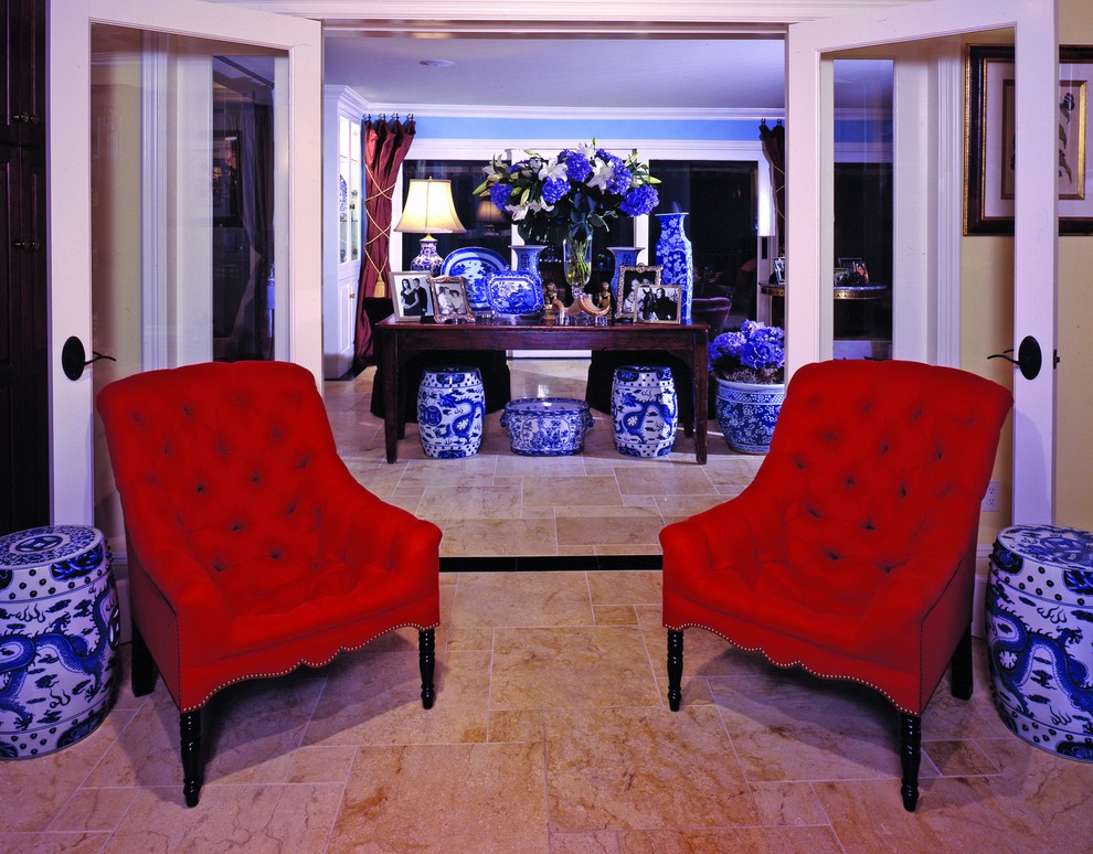 Inspiration for a timeless living room remodel in Los Angeles with blue walls