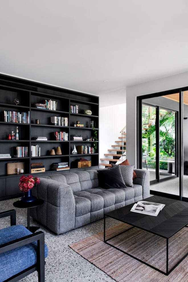 Идея дизайна: открытая гостиная комната среднего размера в современном стиле с белыми стенами и бетонным полом