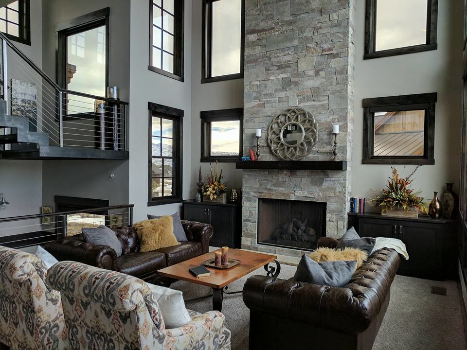 Example of a mid-sized mountain style open concept and formal carpeted and gray floor living room design in Salt Lake City with gray walls, a standard fireplace, a stone fireplace and no tv