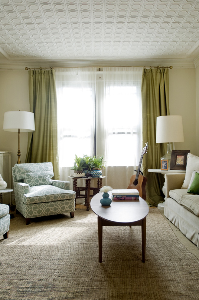 Photo of a contemporary living room in Boston with beige walls.