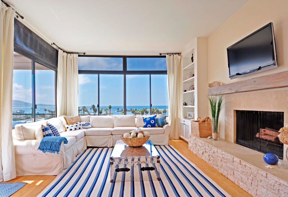 Coastal living room in Los Angeles with beige walls.