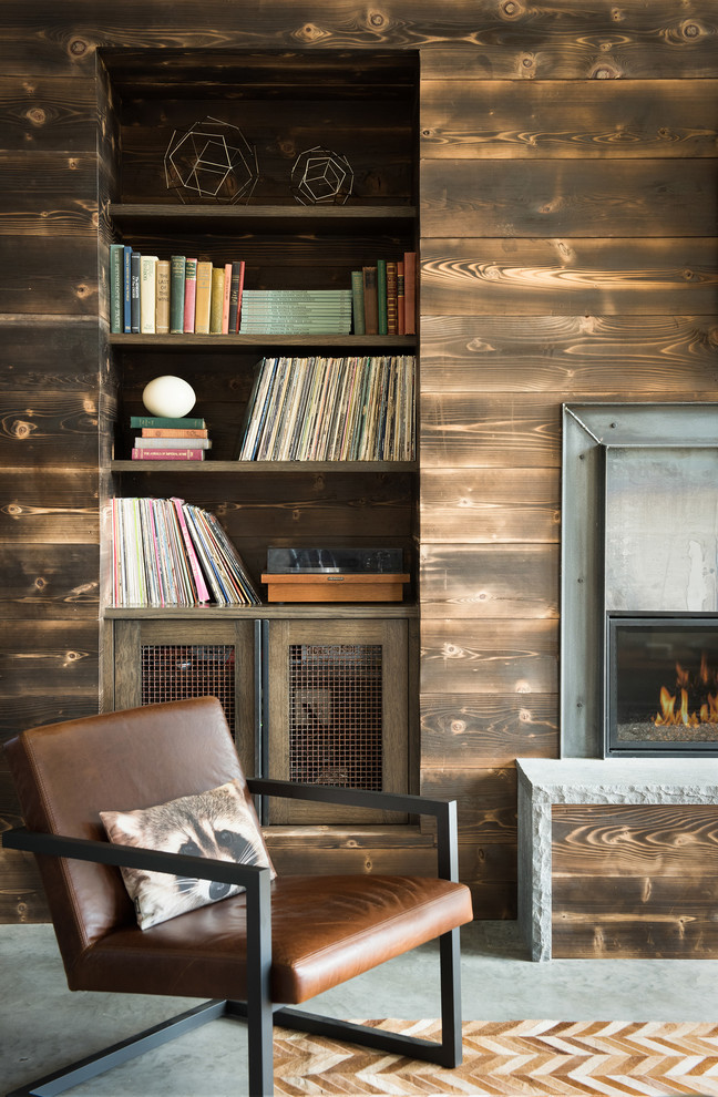 Источник вдохновения для домашнего уюта: гостиная комната в стиле рустика с коричневыми стенами, бетонным полом и горизонтальным камином