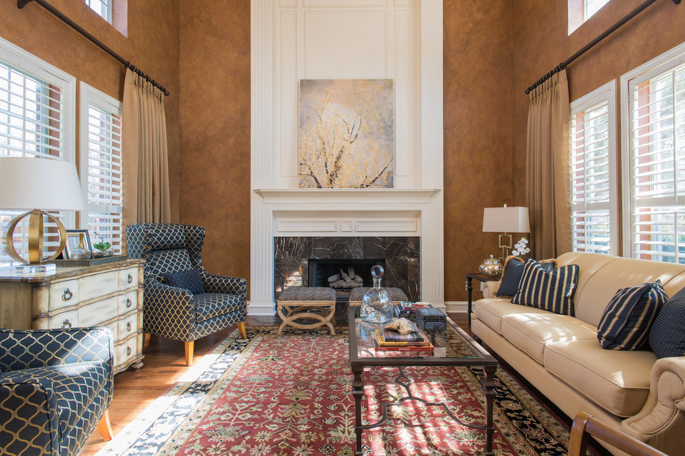 Photo of a medium sized victorian formal enclosed living room in Dallas with brown walls, medium hardwood flooring, a standard fireplace, a tiled fireplace surround, no tv and brown floors.