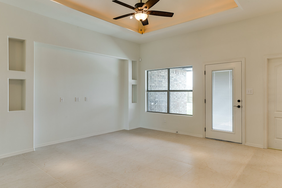 Large mediterranean open plan living room in Austin with white walls, porcelain flooring, no fireplace and no tv.