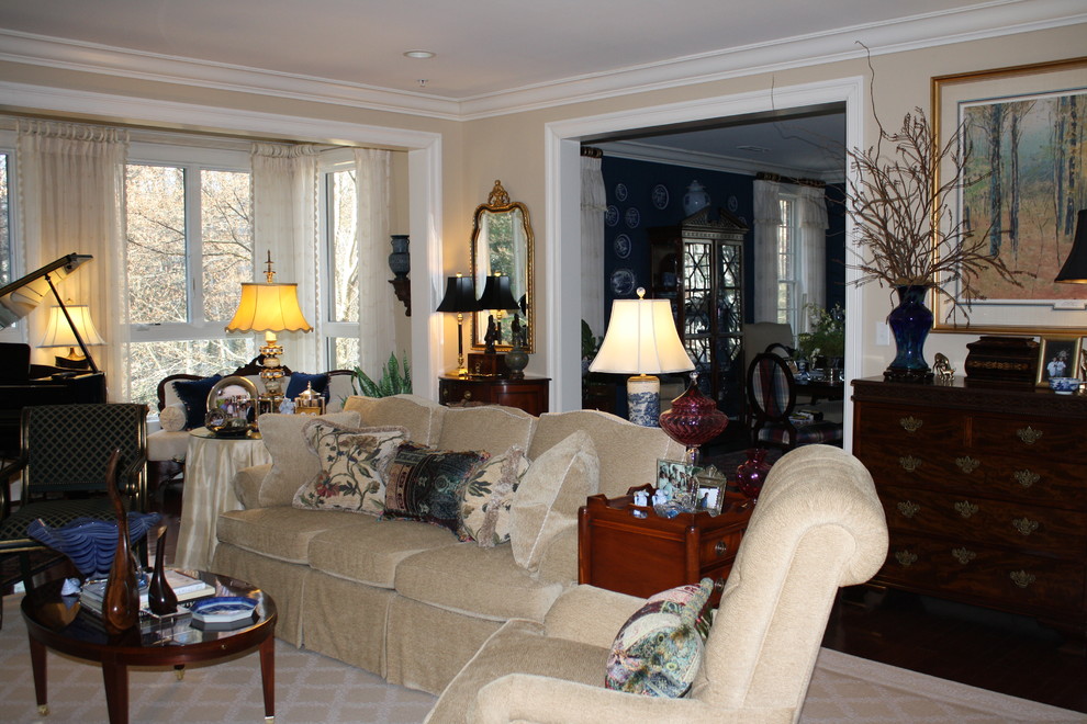 Living room - mid-sized traditional formal and enclosed dark wood floor living room idea in Raleigh with beige walls, no fireplace and no tv