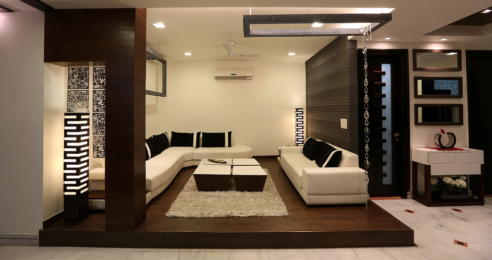 Design ideas for a contemporary living room in Delhi.