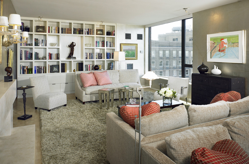 Example of a huge transitional living room library design in Boston