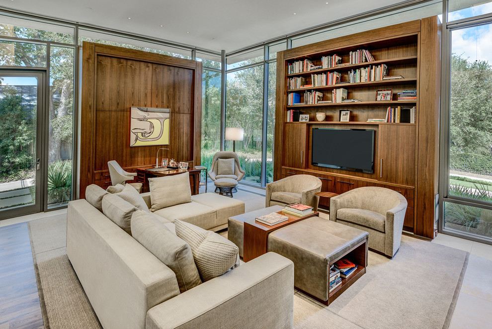 Immagine di un grande soggiorno moderno aperto con sala formale, pavimento in cemento, TV a parete e pavimento beige