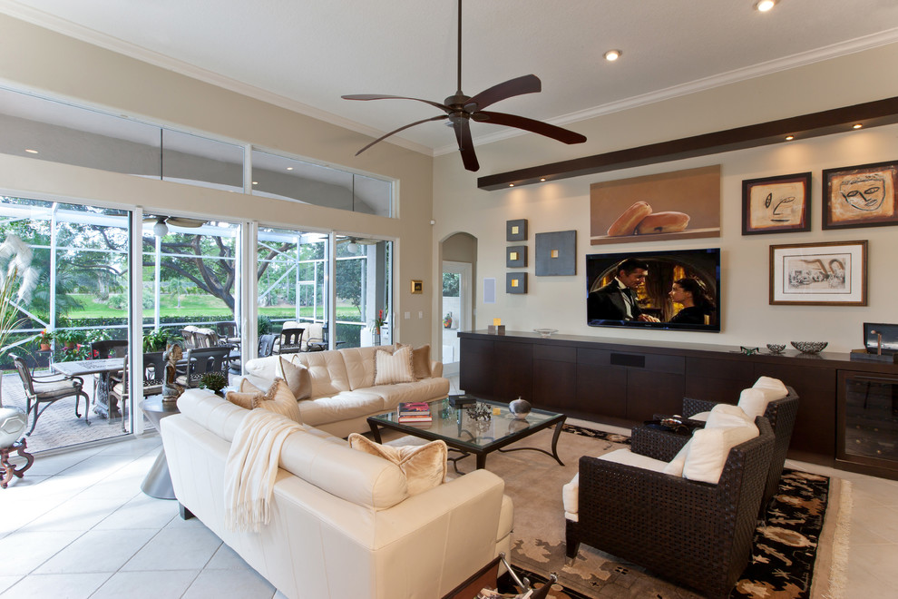 Inspiration for a contemporary open plan living room in Miami with a wall mounted tv.