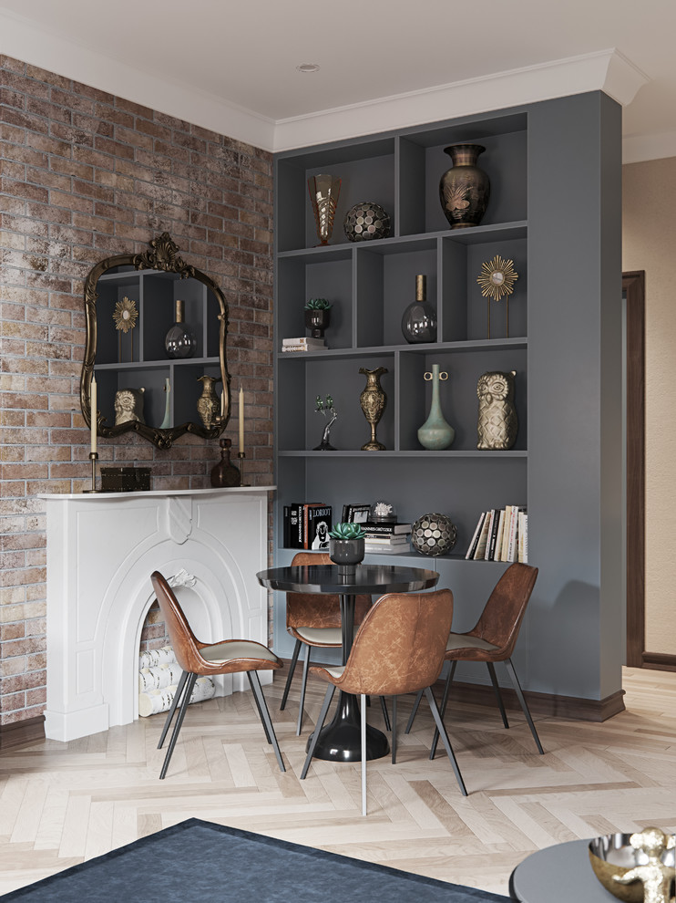 Cette photo montre un salon tendance avec un mur gris, parquet clair, une cheminée standard et un sol beige.