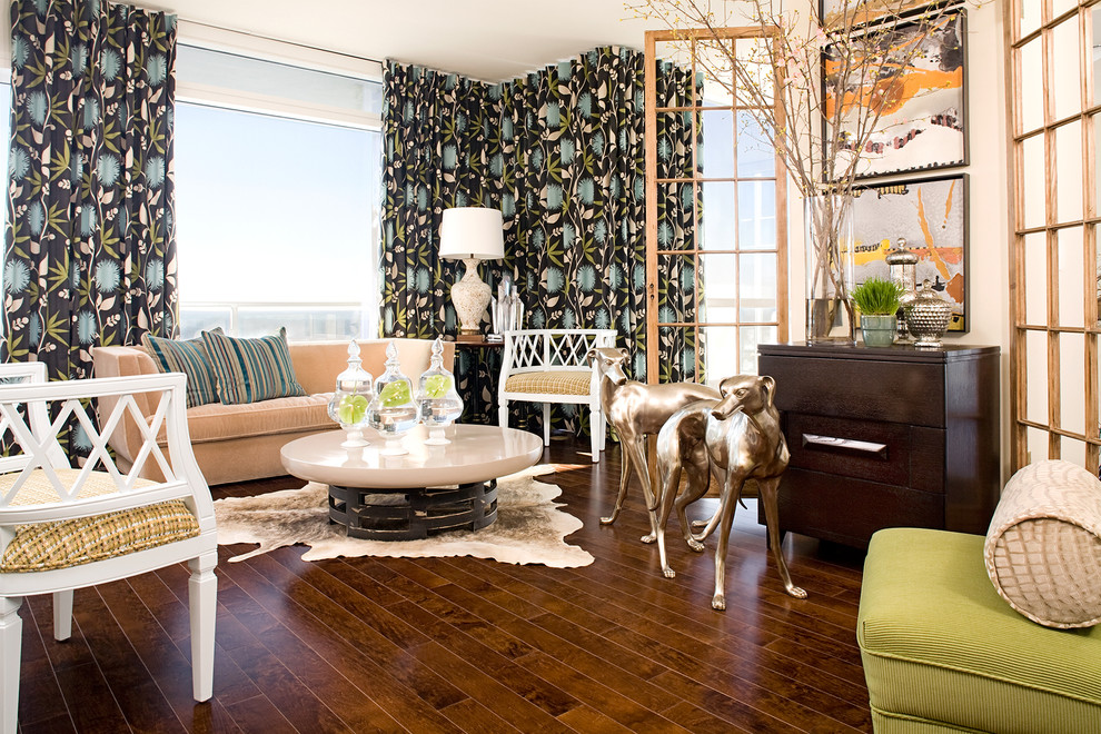 Photo of an eclectic living room in Atlanta with medium hardwood flooring.