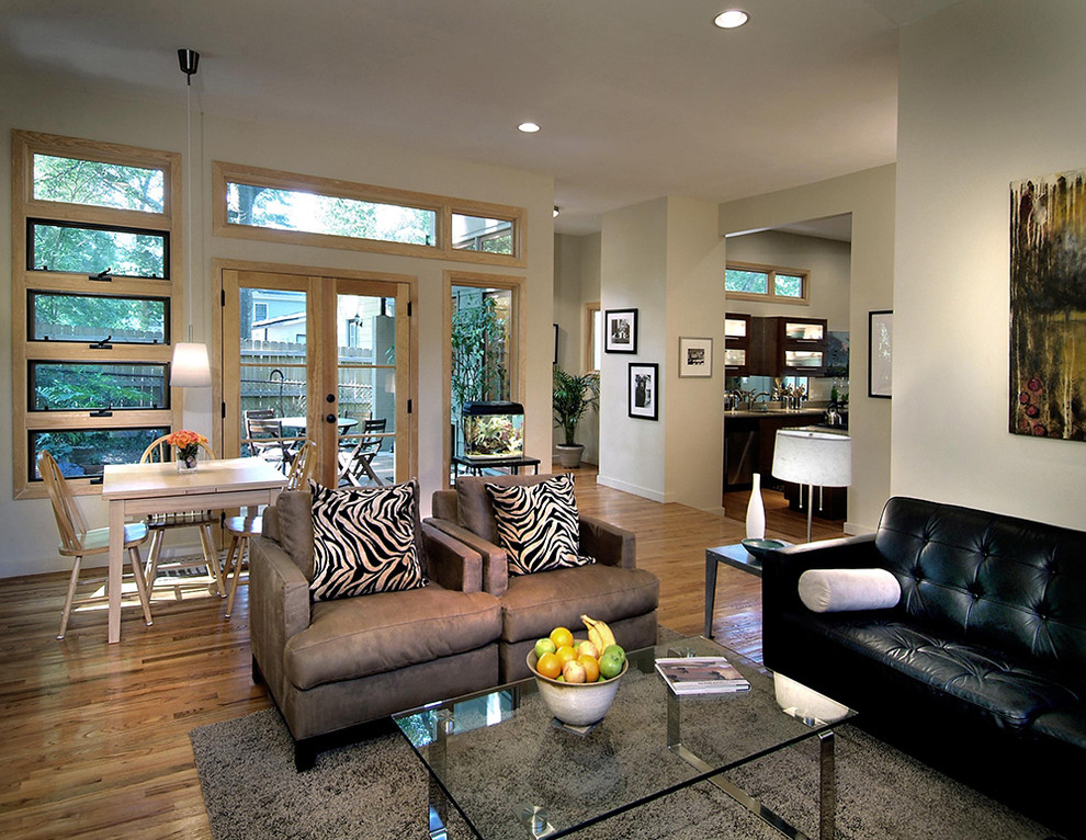 Foto di un soggiorno design con pareti beige
