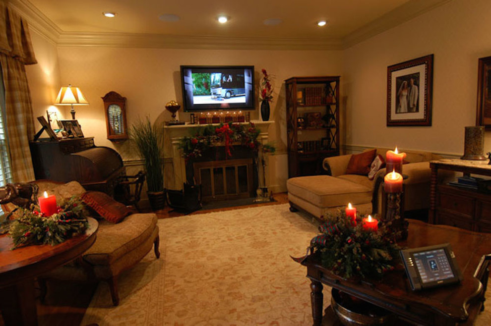 Photo of a large contemporary enclosed living room in Other with beige walls, carpet, a standard fireplace, a stone fireplace surround and a wall mounted tv.