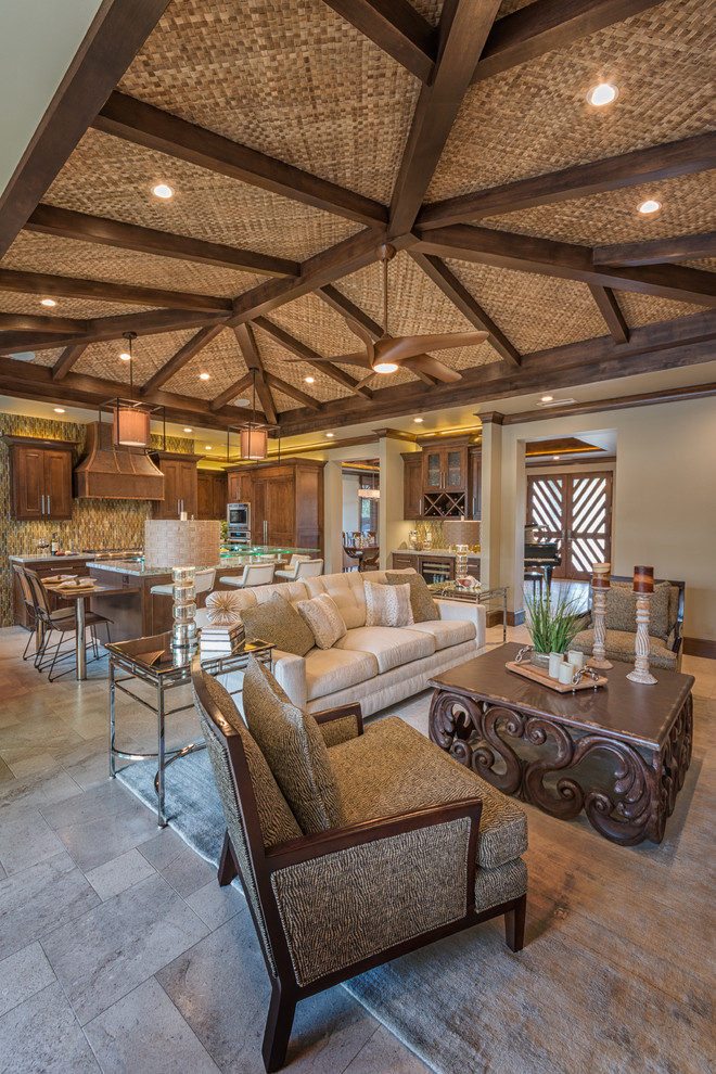 Mid-sized island style open concept travertine floor living room photo in San Diego with a bar, beige walls, a ribbon fireplace, a stone fireplace and a wall-mounted tv