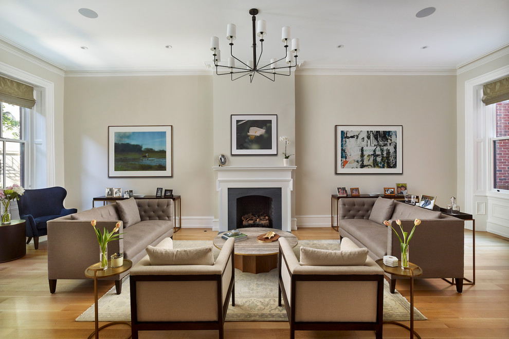 Living room - transitional formal medium tone wood floor and brown floor living room idea in Philadelphia with beige walls and a standard fireplace