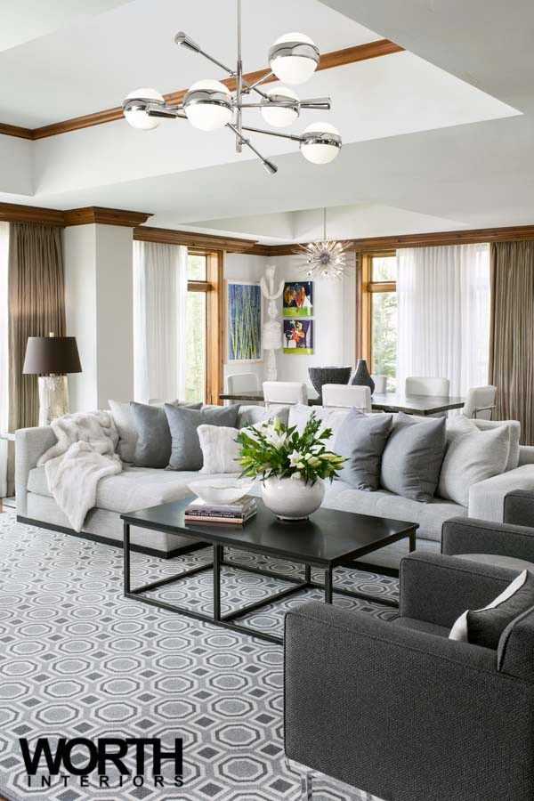 Immagine di un soggiorno minimal di medie dimensioni e aperto con pareti grigie