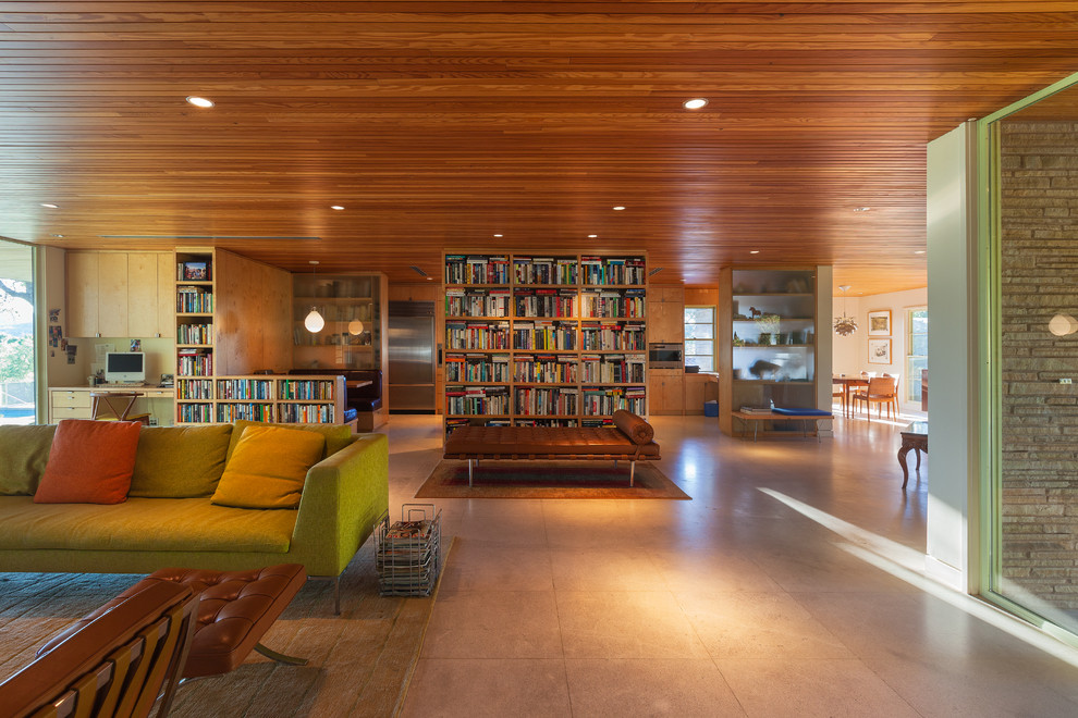 Immagine di un ampio soggiorno minimalista aperto con sala formale, pareti beige e pavimento in pietra calcarea