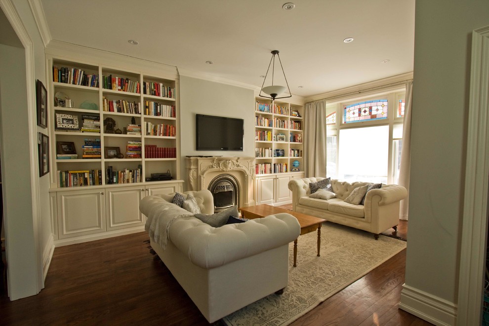 Inspiration for a medium sized classic open plan living room in Toronto with a reading nook, grey walls, dark hardwood flooring, a standard fireplace, a stone fireplace surround and a wall mounted tv.