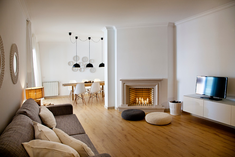 Example of a transitional living room design in Other with white walls