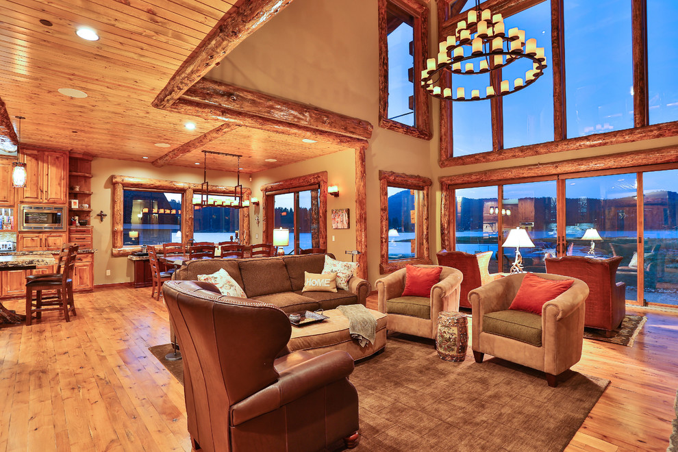 Living room - small rustic formal and open concept medium tone wood floor living room idea in Los Angeles