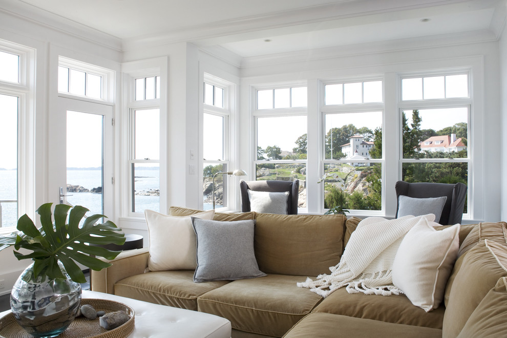 Example of a transitional living room design in Boston with white walls