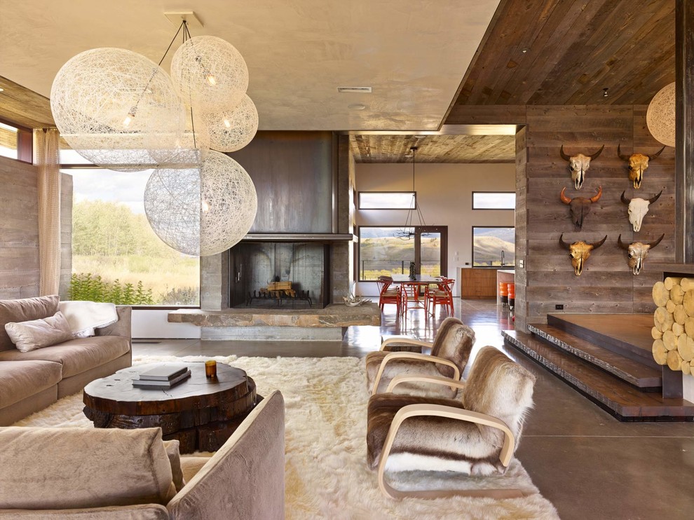 Inspiration for a rustic open plan living room in Other with a standard fireplace.