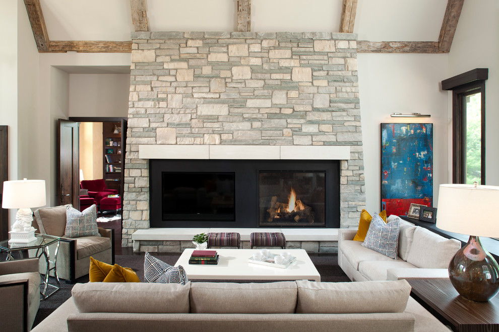 Living room - transitional formal and open concept dark wood floor living room idea in Minneapolis with gray walls, a standard fireplace, a stone fireplace and a media wall