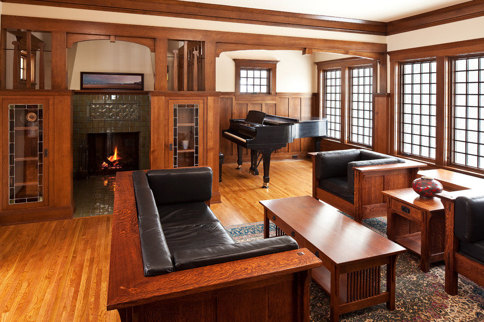 Design ideas for a classic formal open plan living room in Minneapolis with white walls, medium hardwood flooring, a standard fireplace and a tiled fireplace surround.