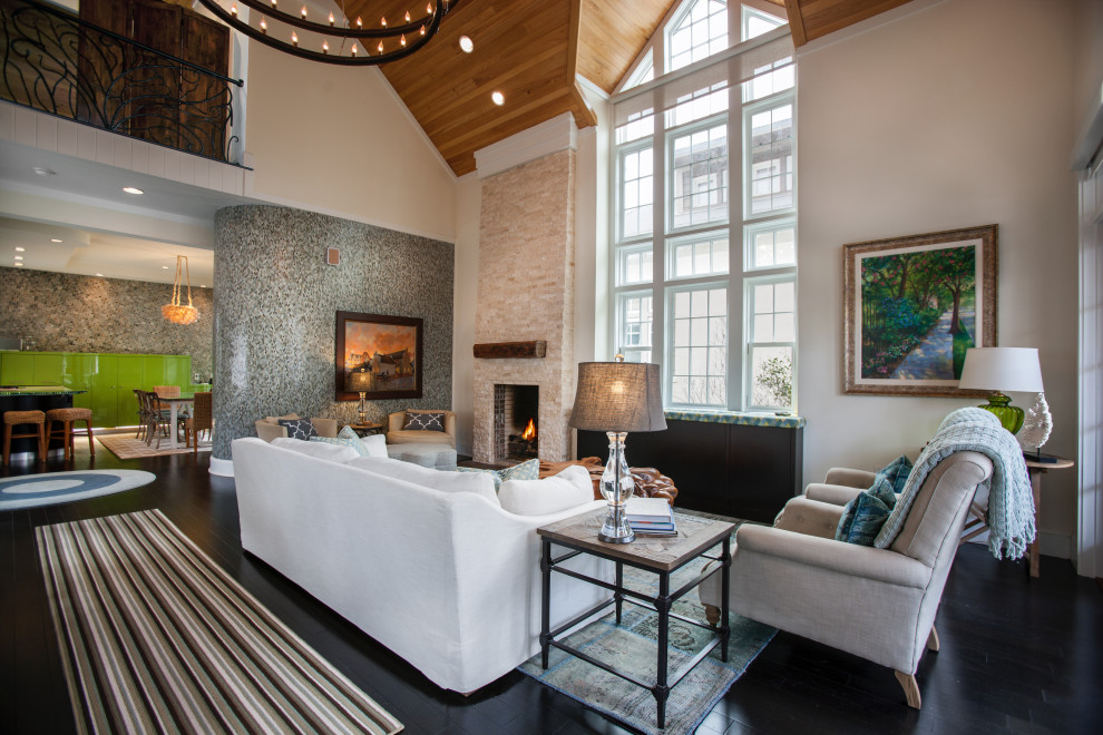 This is an example of a nautical open plan living room in Miami with beige walls, dark hardwood flooring, a standard fireplace, a brick fireplace surround, a concealed tv and brown floors.