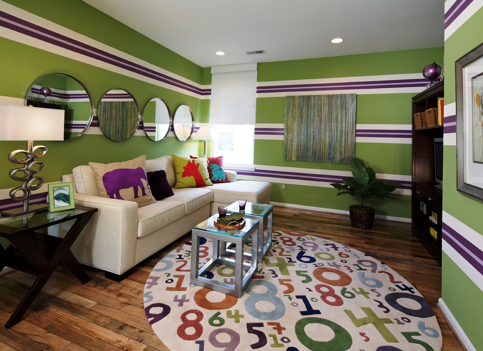 Foto di un soggiorno eclettico con pareti verdi