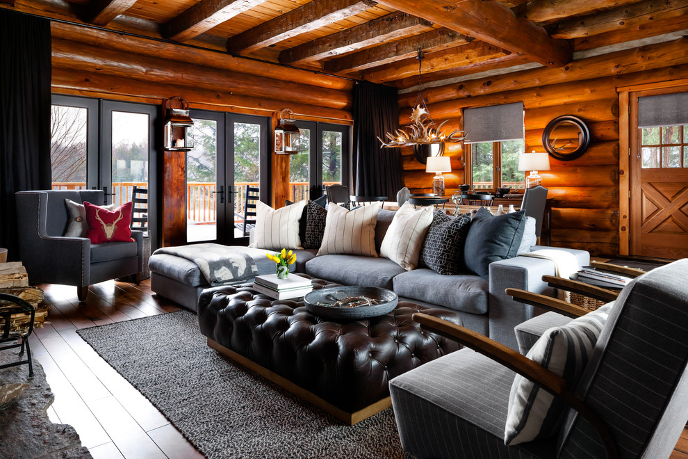 Inspiration for a rustic formal and open concept medium tone wood floor living room remodel in Toronto
