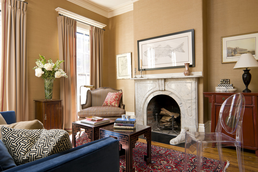 Living room - eclectic living room idea in Boston with beige walls and a standard fireplace