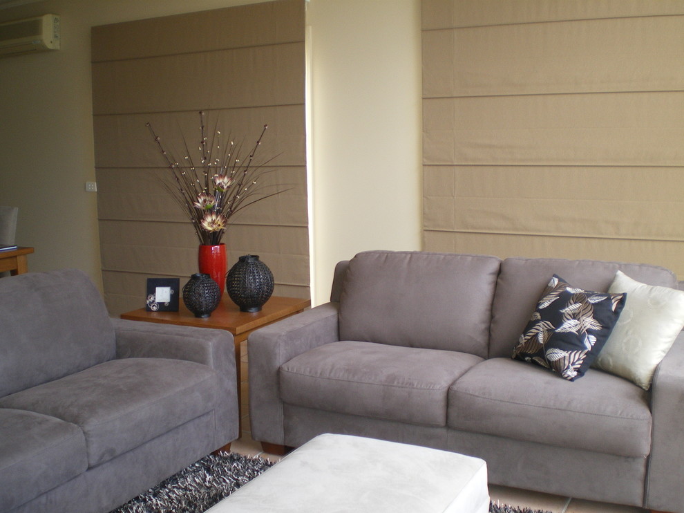Ispirazione per un grande soggiorno minimal aperto con pareti beige