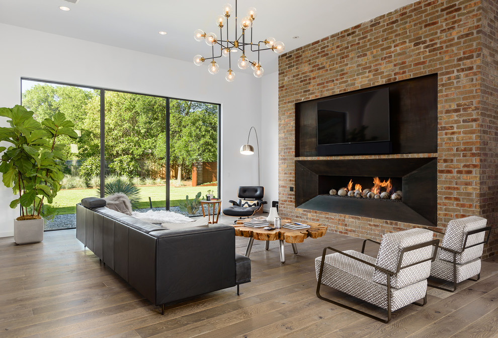 Living room - contemporary dark wood floor and brown floor living room idea in Dallas with white walls, a ribbon fireplace and a metal fireplace