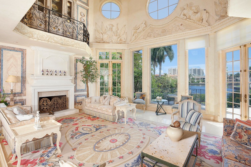 Expansive mediterranean living room in Miami with a standard fireplace.