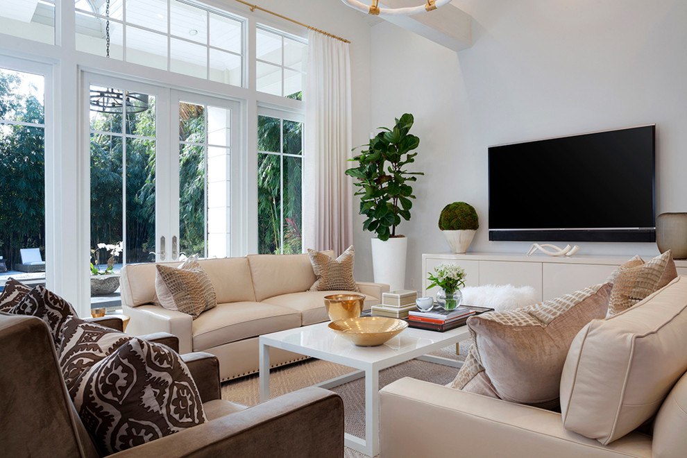 Design ideas for a medium sized mediterranean formal enclosed living room in Miami with white walls, carpet, no fireplace and a wall mounted tv.