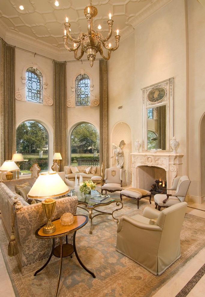 Tuscan formal and enclosed living room photo in Houston with beige walls, a standard fireplace and a stone fireplace