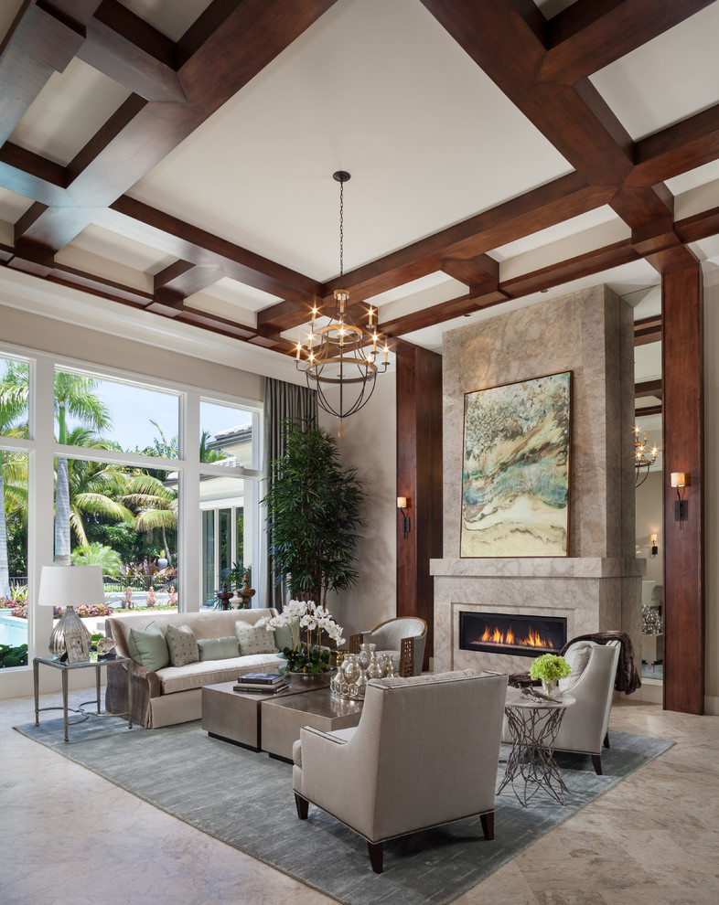 Classic living room in Miami with a ribbon fireplace and feature lighting.