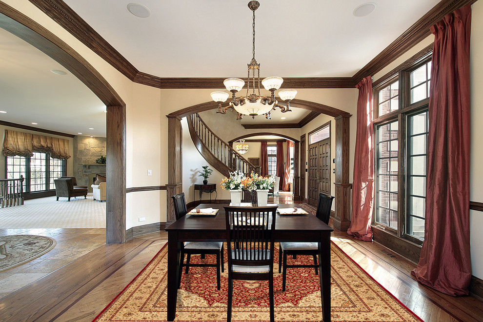 Photo of a large traditional dining room in Baltimore with beige walls and light hardwood flooring.